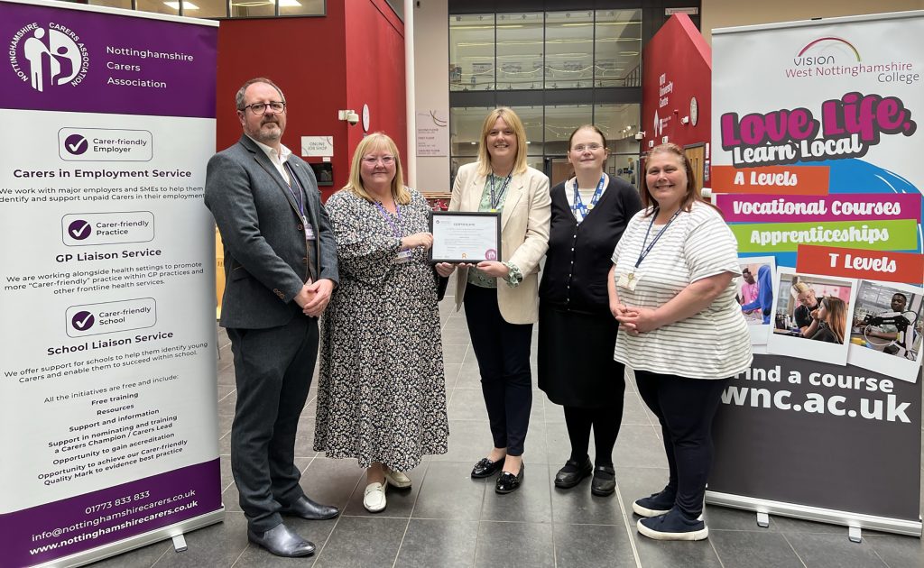 Educators receiving certificate from Nottinghamshire Carers Association